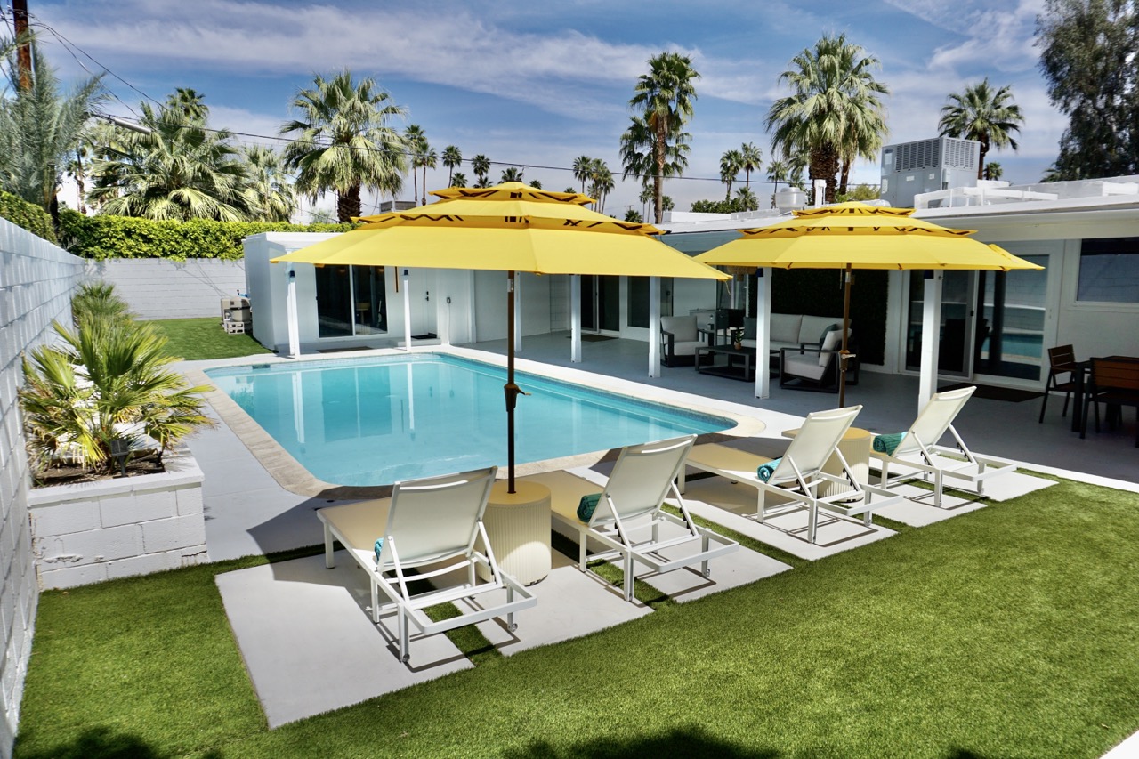 Pool with shaded umbrellas